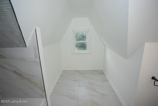 1436 Huntoon Ave, Louisville, KY 40215 - bonus room featuring marble finish flooring, vaulted ceiling, and baseboards