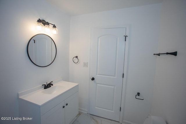 1436 Huntoon Ave, Louisville, KY 40215 - bathroom featuring vanity, marble look tile flooring, and baseboards