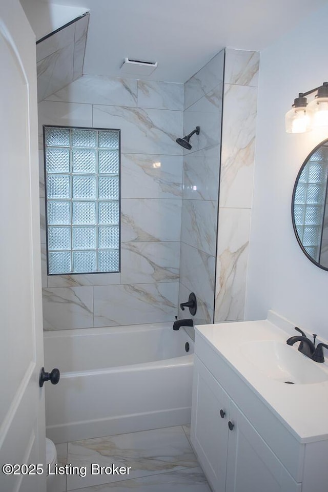 1436 Huntoon Ave, Louisville, KY 40215 - bathroom with vanity, bathing tub / shower combination, marble finish flooring, and toilet