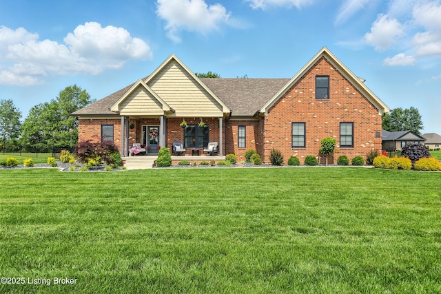131 Gavin Dr, Shepherdsville, KY 40165 - craftsman-style home with brick siding, a front yard, and roof with shingles