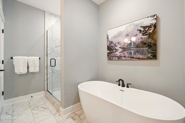 131 Gavin Dr, Shepherdsville, KY 40165 - full bathroom with marble look tile flooring, a freestanding bath, and a shower stall