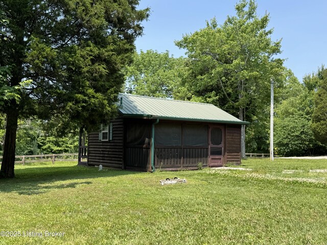661 Blue Bird Rd, Falls Of Rough, KY 40119 - view of outdoor structure with a sunroom