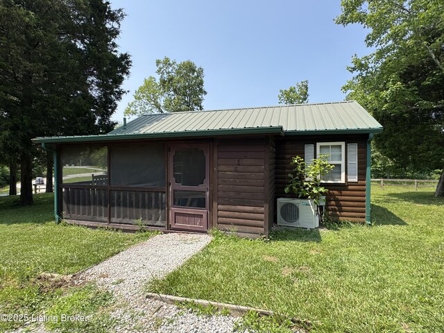661 Blue Bird Rd, Falls Of Rough, KY 40119 - view of outbuilding featuring ac unit and a sunroom