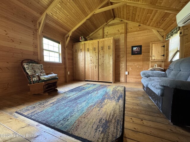 661 Blue Bird Rd, Falls Of Rough, KY 40119 - living area with an AC wall unit, wooden walls, hardwood / wood-style floors, and wooden ceiling