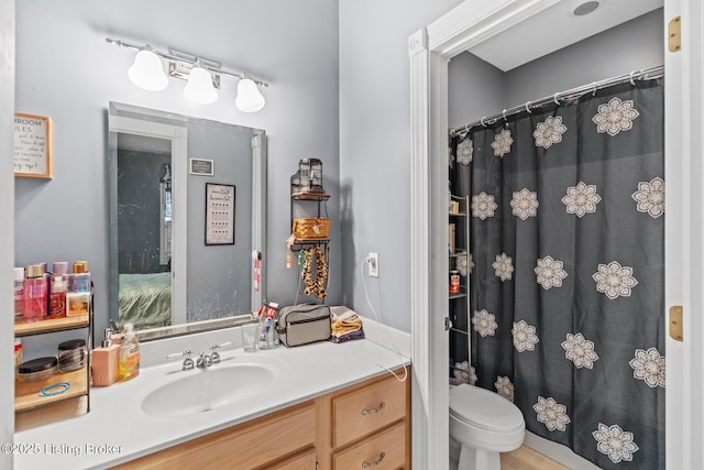 177 Airport Rd, Leitchfield, KY 42754 - bathroom featuring toilet, vanity, and a shower with curtain