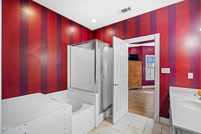 177 Airport Rd, Leitchfield, KY 42754 - full bathroom with tile patterned flooring, a stall shower, vanity, and baseboards