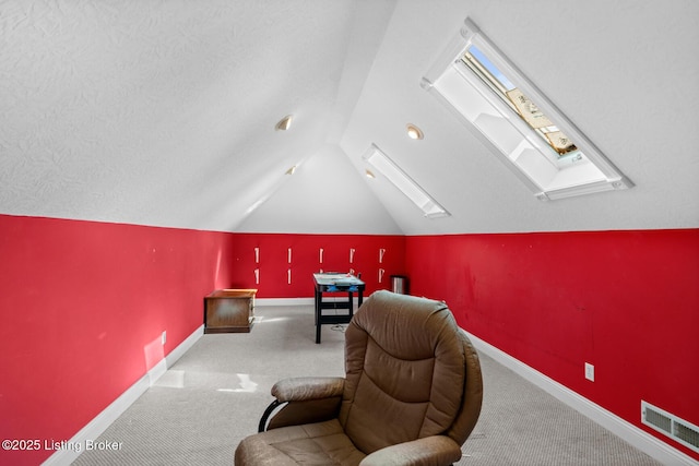 177 Airport Rd, Leitchfield, KY 42754 - carpeted home theater with a skylight, vaulted ceiling, and baseboards