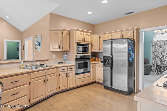 177 Airport Rd, Leitchfield, KY 42754 - kitchen featuring appliances with stainless steel finishes, light brown cabinets, a sink, light wood-type flooring, and light countertops