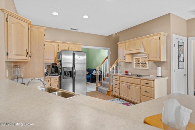 177 Airport Rd, Leitchfield, KY 42754 - kitchen featuring stainless steel fridge with ice dispenser, light brown cabinetry, a sink, light countertops, and black electric stovetop