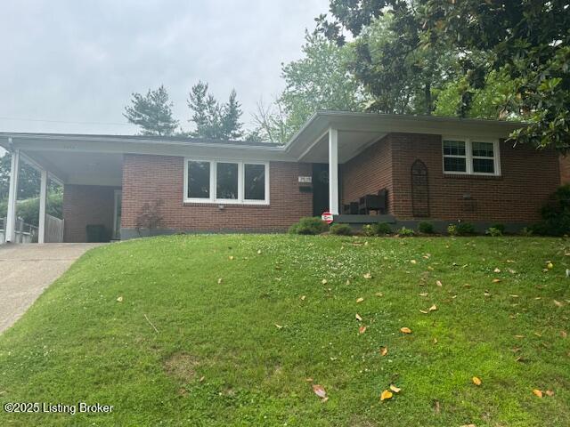 7515 Merlyn Cir, Louisville, KY 40214 - ranch-style home featuring brick siding, a front lawn, driveway, and an attached carport