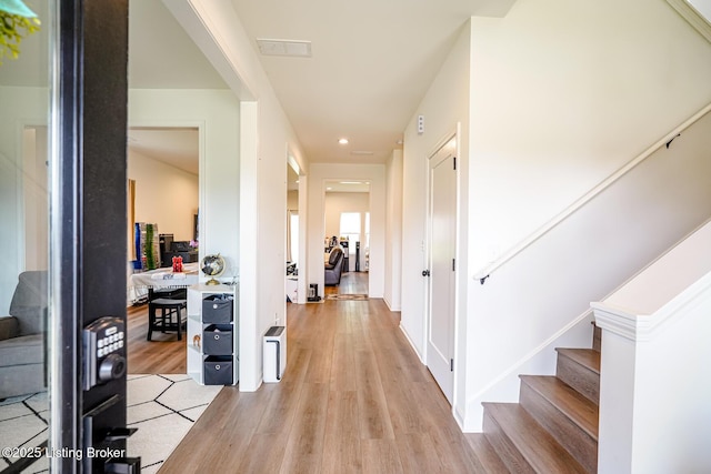 7707 Cottage Cove Way, Louisville, KY 40214 - hall featuring light wood-style floors, stairs, and recessed lighting