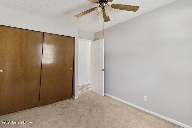 6600 Musket Dr, Louisville, KY 40228 - unfurnished bedroom featuring carpet floors, a closet, and a ceiling fan
