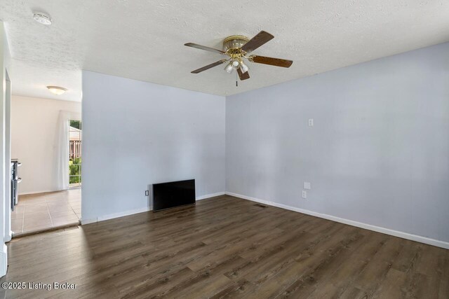 6600 Musket Dr, Louisville, KY 40228 - spare room with ceiling fan, wood finished floors, a smoke detector, and a textured ceiling