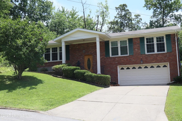 502 Hill Ridge Rd, Louisville, KY 40214 - raised ranch with driveway, brick siding, a front lawn, and an attached garage