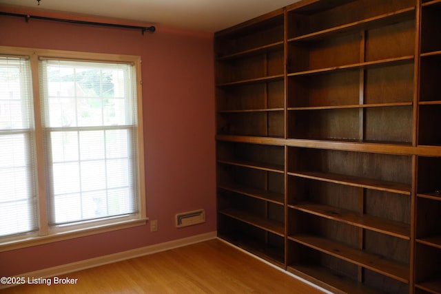 502 Hill Ridge Rd, Louisville, KY 40214 - empty room with wood finished floors and healthy amount of natural light