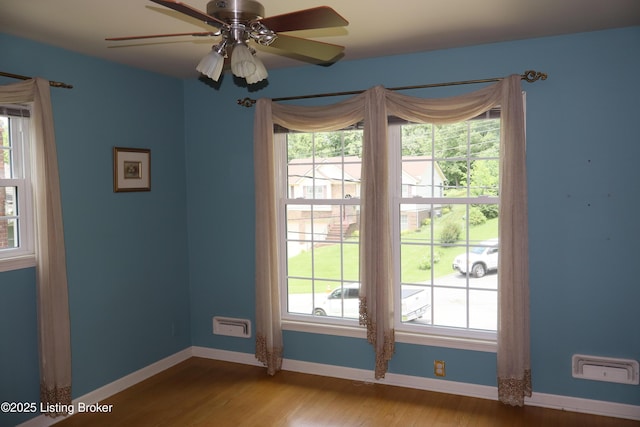 502 Hill Ridge Rd, Louisville, KY 40214 - unfurnished room with plenty of natural light, wood finished floors, and ceiling fan