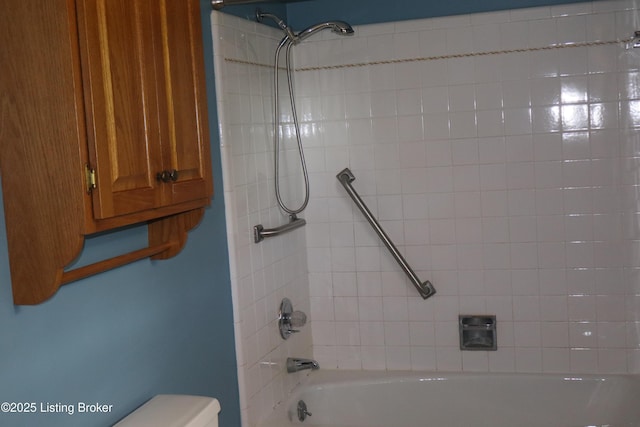 502 Hill Ridge Rd, Louisville, KY 40214 - bathroom featuring tub / shower combination and toilet