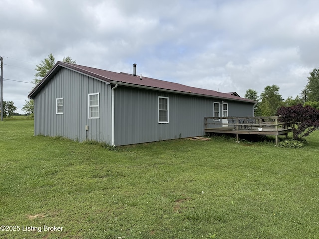 775 Constantine Vertrees Rd, Garfield, KY 40140 - back of property featuring a wooden deck, a yard, and metal roof