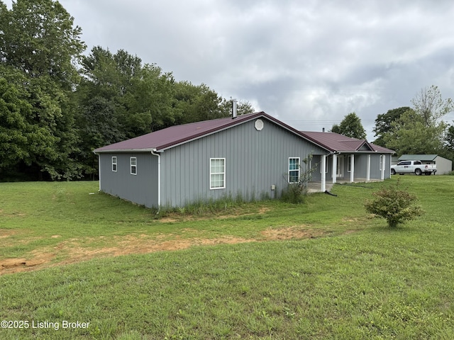 775 Constantine Vertrees Rd, Garfield, KY 40140 - view of property exterior featuring metal roof and a yard