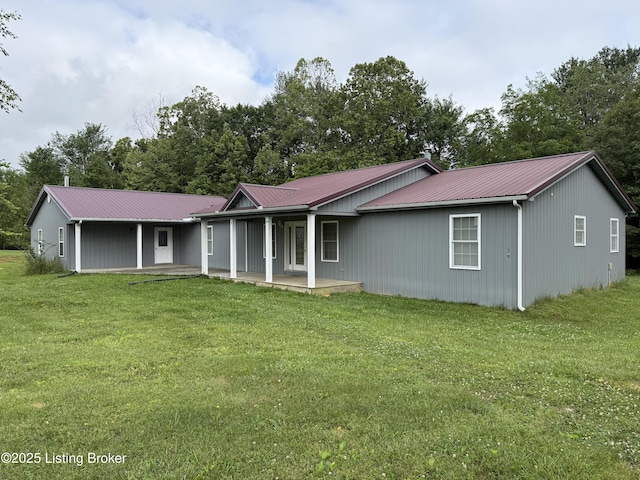 775 Constantine Vertrees Rd, Garfield, KY 40140 - ranch-style house featuring a front yard, metal roof, and a porch