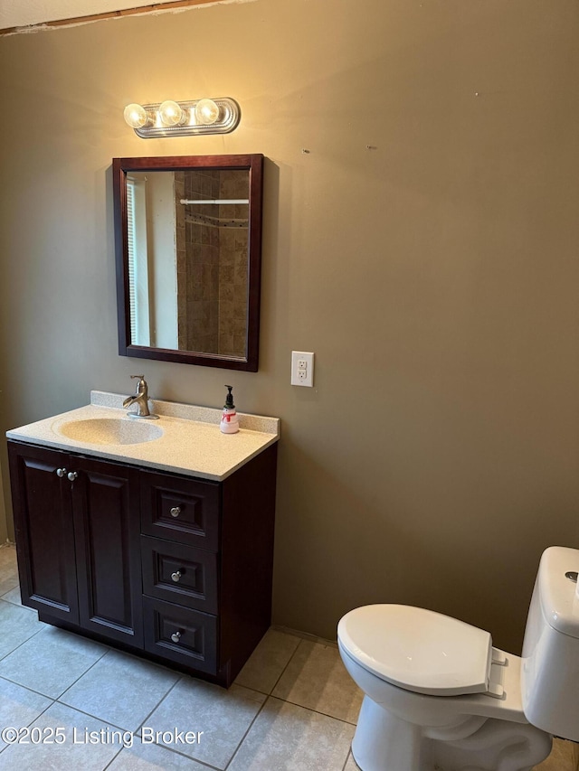 775 Constantine Vertrees Rd, Garfield, KY 40140 - full bathroom featuring toilet, tile patterned floors, vanity, and baseboards