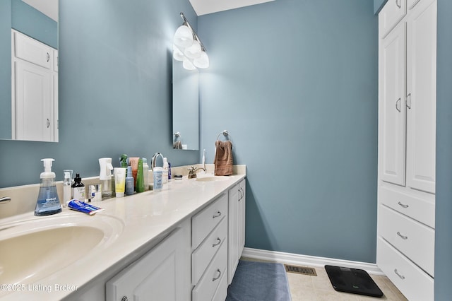 4107 Dolphin Rd, Louisville, KY 40220 - bathroom with double vanity, baseboards, and tile patterned flooring