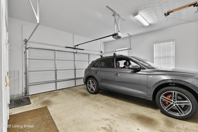 4107 Dolphin Rd, Louisville, KY 40220 - garage featuring a garage door opener