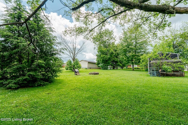 1117 Breezy Way, Bardstown, KY 40004 - view of grassy yard with a fire pit