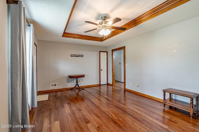 1117 Breezy Way, Bardstown, KY 40004 - unfurnished room with wood finished floors, a ceiling fan, and a raised ceiling
