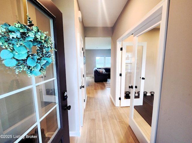 309 Knowledge Point Path, Shelbyville, KY 40065 - corridor with french doors and light wood finished floors