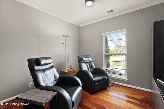 1406 Rutland Club Ct, Louisville, KY 40245 - sitting room with crown molding, baseboards, and wood finished floors