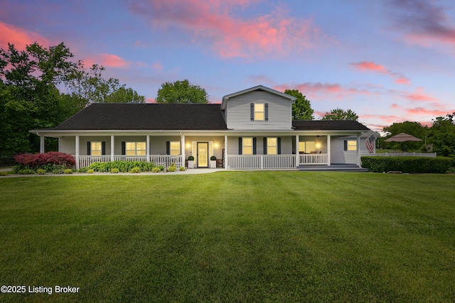 1717 Stricker Rd, Memphis, IN 47143 - back of property at dusk with a porch and a lawn