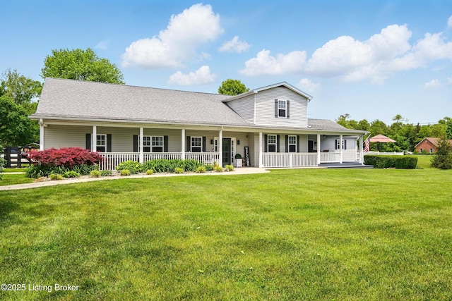 1717 Stricker Rd, Memphis, IN 47143 - farmhouse with a porch, a front yard, and roof with shingles