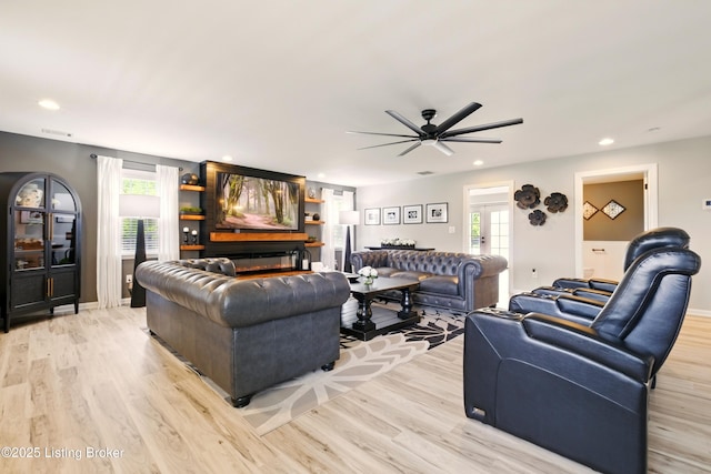 1717 Stricker Rd, Memphis, IN 47143 - living area with light wood-style flooring, healthy amount of natural light, ceiling fan, and recessed lighting