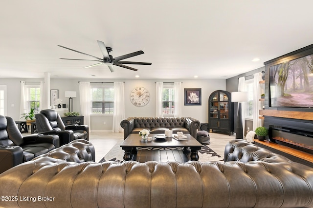 1717 Stricker Rd, Memphis, IN 47143 - living area featuring light wood-style flooring, a ceiling fan, and recessed lighting
