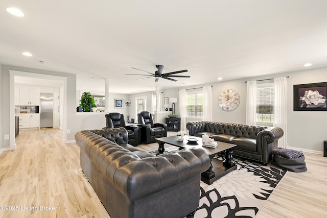 1717 Stricker Rd, Memphis, IN 47143 - living area with light wood finished floors, baseboards, a ceiling fan, and recessed lighting