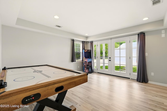 1717 Stricker Rd, Memphis, IN 47143 - game room with french doors, light wood-type flooring, recessed lighting, and baseboards