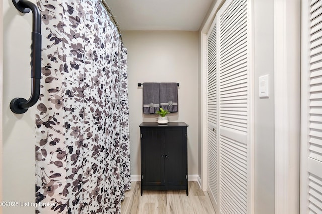 1717 Stricker Rd, Memphis, IN 47143 - full bathroom with wood finished floors, a closet, and curtained shower