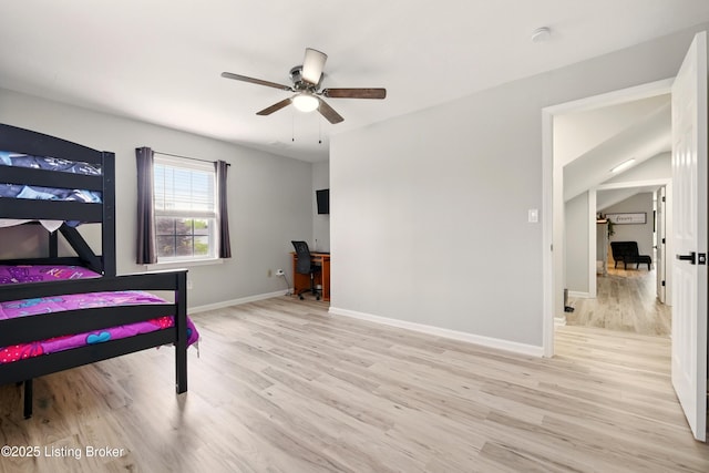 1717 Stricker Rd, Memphis, IN 47143 - bedroom with a desk, light wood-type flooring, baseboards, and a ceiling fan