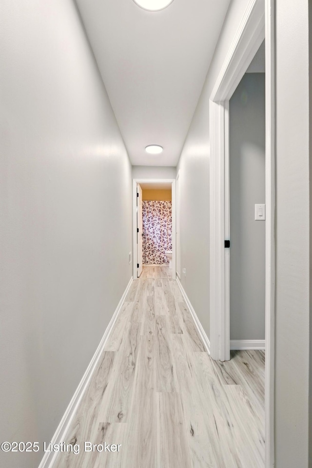1717 Stricker Rd, Memphis, IN 47143 - hall featuring wood finished floors and baseboards