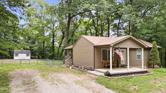 90 Shellys Trce, Brandenburg, KY 40108 - view of front of property with view of wooded area and a shingled roof