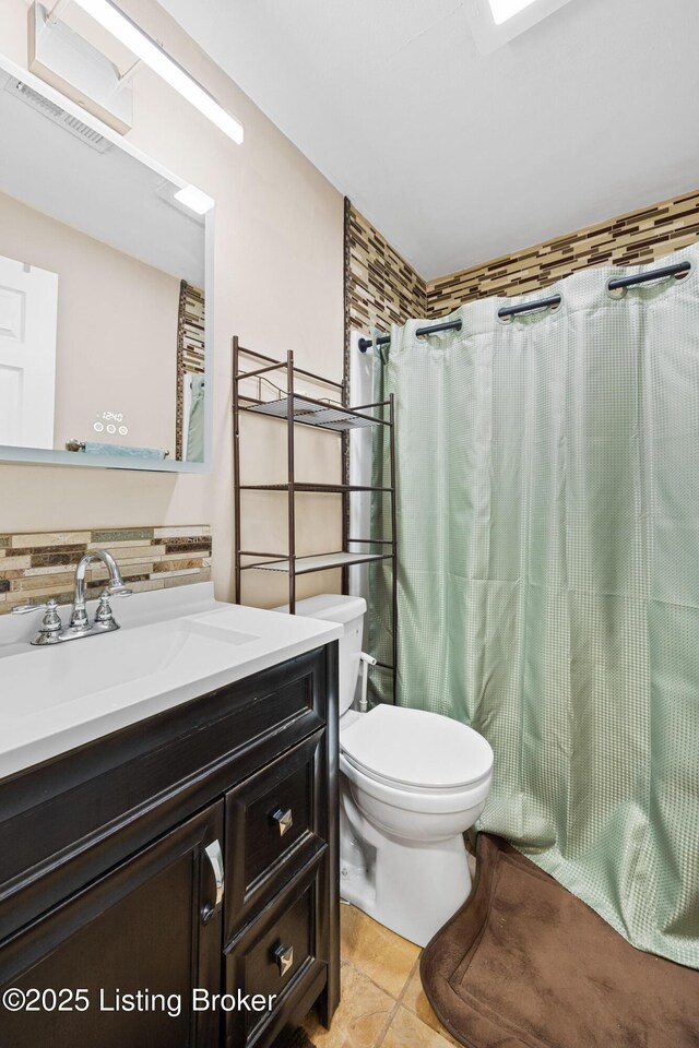 90 Shellys Trce, Brandenburg, KY 40108 - bathroom with toilet, vanity, tile patterned flooring, and a shower with shower curtain