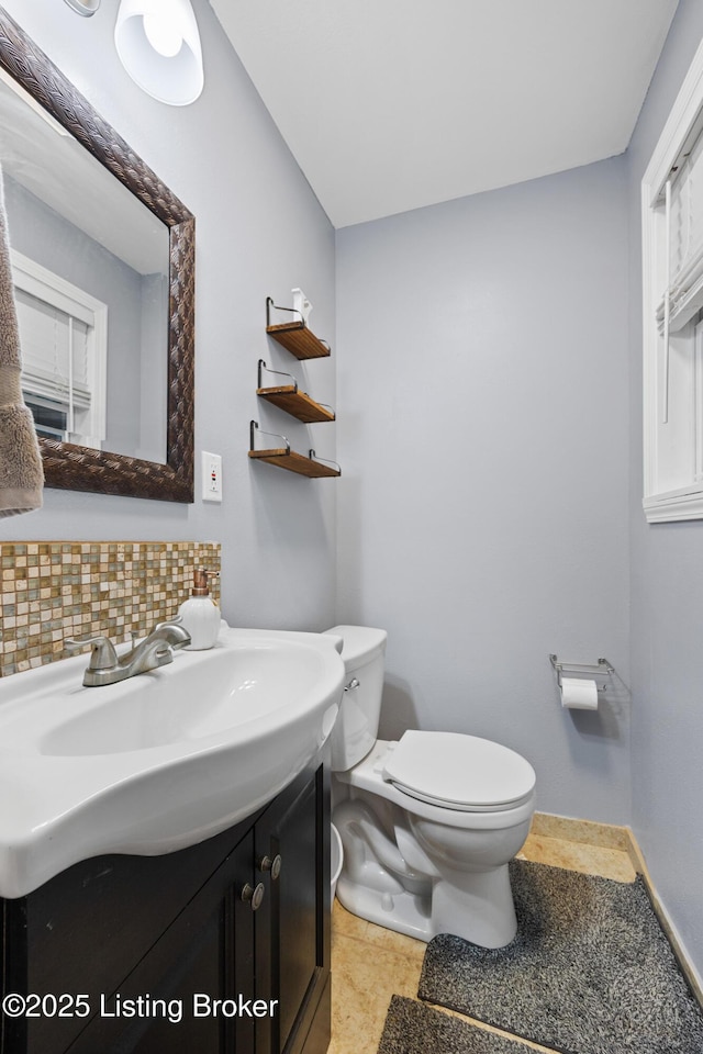 90 Shellys Trce, Brandenburg, KY 40108 - half bath featuring toilet, backsplash, vanity, and tile patterned floors