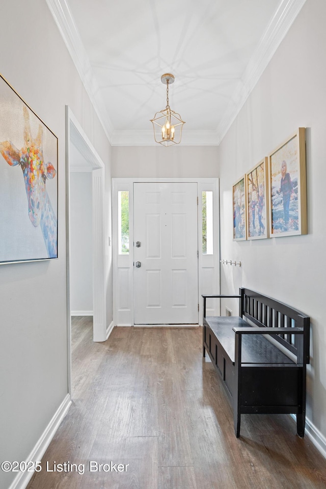 14312 Micawber Way, Louisville, KY 40245 - foyer with a chandelier, healthy amount of natural light, wood finished floors, crown molding, and baseboards