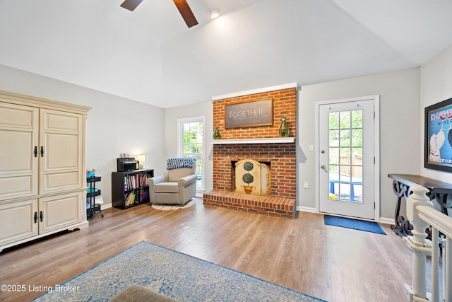 14312 Micawber Way, Louisville, KY 40245 - living room with wood finished floors, plenty of natural light, a ceiling fan, lofted ceiling, and baseboards