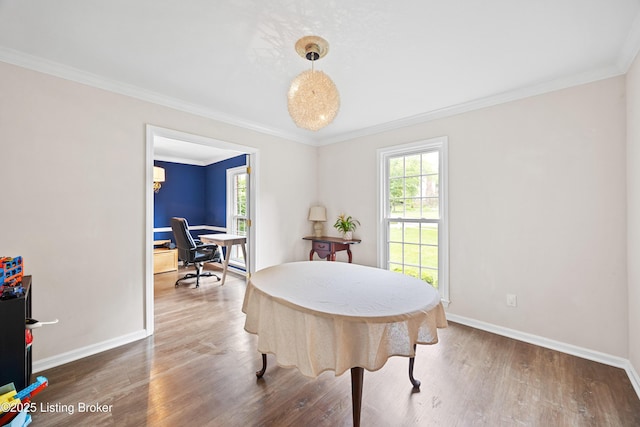 14312 Micawber Way, Louisville, KY 40245 - dining space with plenty of natural light, baseboards, wood finished floors, a desk, and crown molding