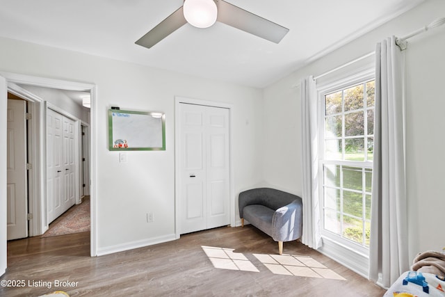 14312 Micawber Way, Louisville, KY 40245 - bedroom with wood finished floors, a ceiling fan, and baseboards