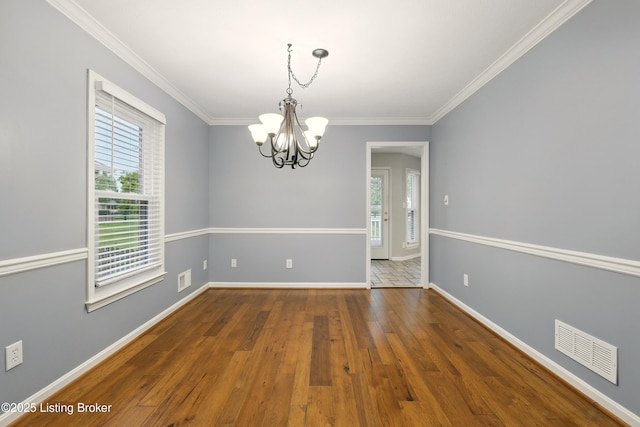 5121 Oaklawn Park Dr, Louisville, KY 40299 - unfurnished room with a chandelier, healthy amount of natural light, wood finished floors, baseboards, and ornamental molding