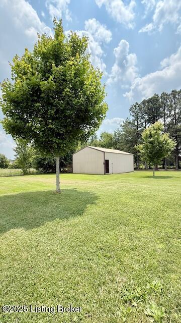187 Glenn Rd, Leitchfield, KY 42754 - view of grassy yard with an outbuilding and an outdoor structure
