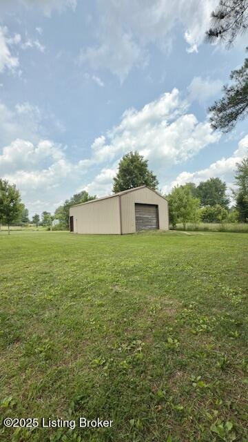 187 Glenn Rd, Leitchfield, KY 42754 - view of grassy yard featuring an outbuilding and a detached garage